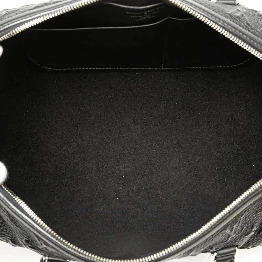 Louis Vuitton Monogram Revelation Neo Papillon GM Handbag